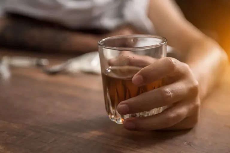 Four red flag signs you’re a functioning alcoholic, according to a doctor.