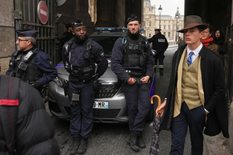 The Dapper Detective Behind the Louvre Heist Photo